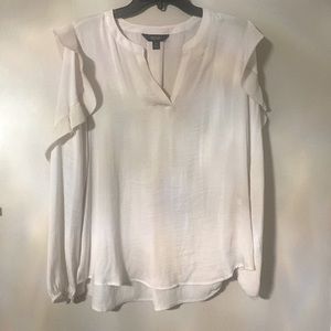 White ruffled Vera Wang blouse.